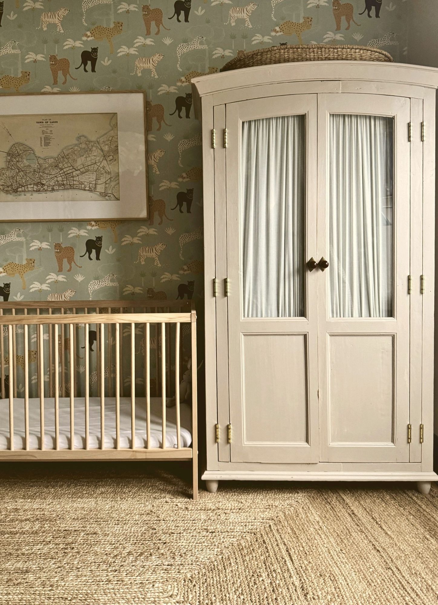 Nursery with painted wardrobe and cot